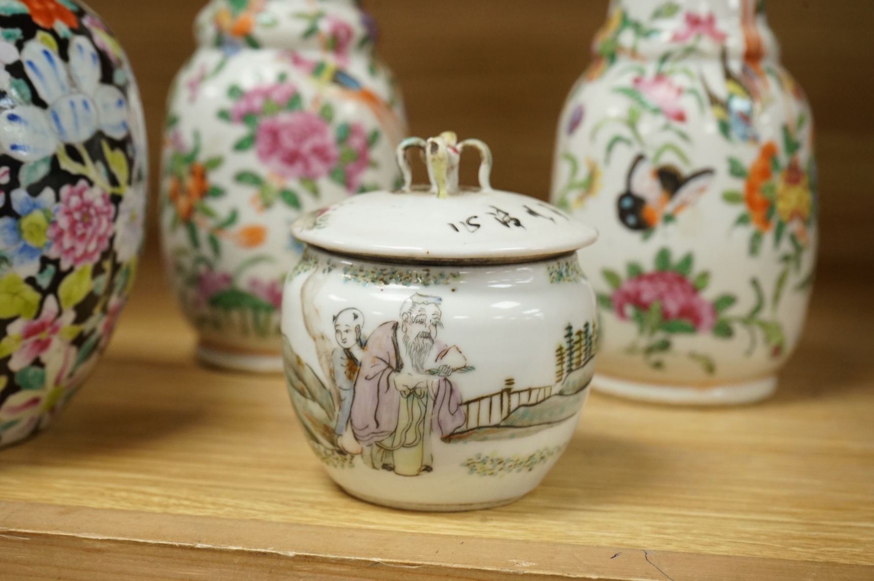 A Chinese 'Thousand Flower' jar, two famille rose vases, and a Republic period jar and cover, largest 19cm high